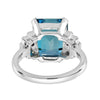 Anillo de Compromiso de Oro con Topacio Azul, Rubí y Diamante